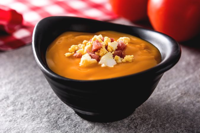 Bowl with salmorejo ham and hard boiled egg