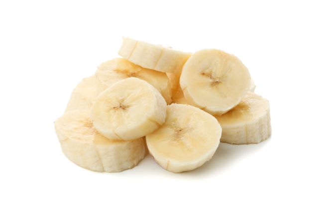 Banana slices isolated on blank background. Fresh fruit