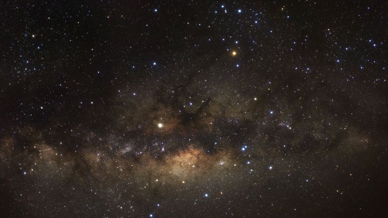 Milky way galaxy with stars and space dust in the universe, Long exposure photograph, with grain.
