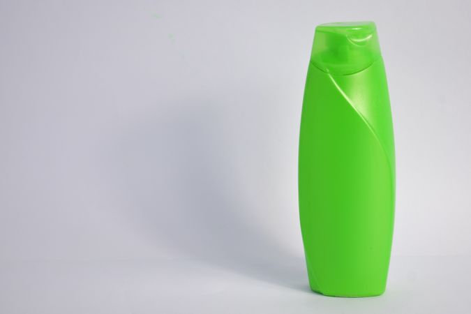 Green mockup body wash bottle with copy space
