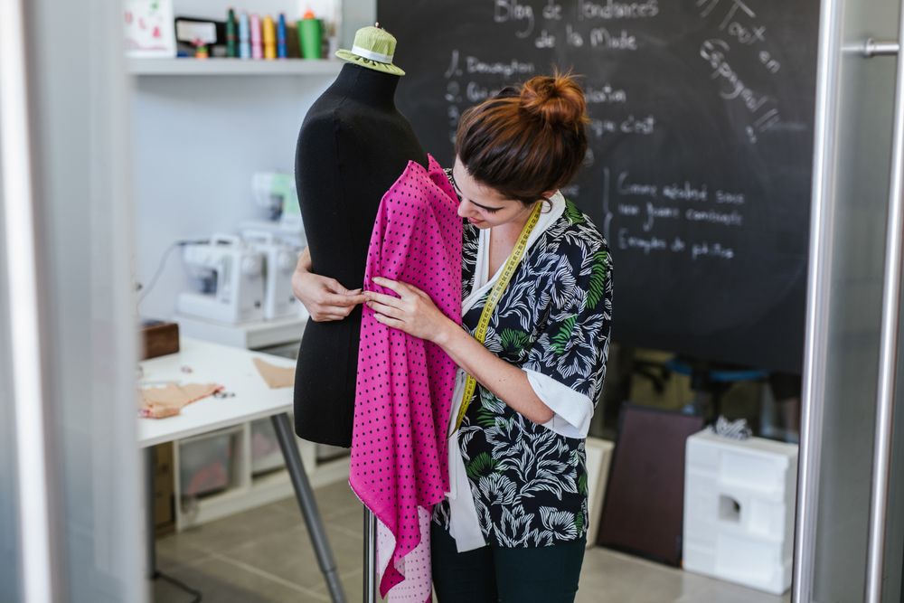 Woman in a sewing school
