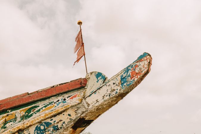 Old boat floating in sea
