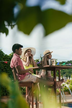 Group of friends drinking beer on the terrace