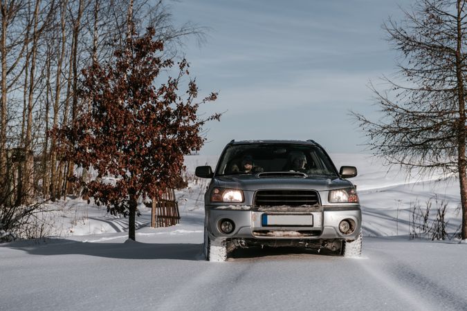 Car driving on snow field