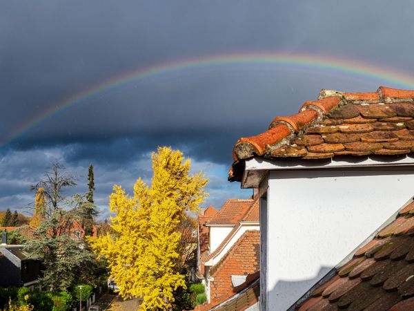 Rainbow after autumn rain over the old quarter of Strasbourg.