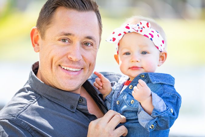 Dad and Baby Girl At The Park
