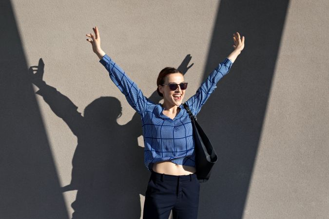 Excited businesswoman jumping