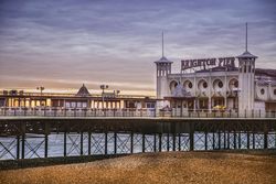 Ornamental building on pier in evening