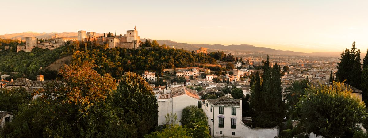 Panorama of Alhambra and Granada landscape from Albaicin at dusk