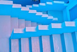 Blue stairs down and up in summer