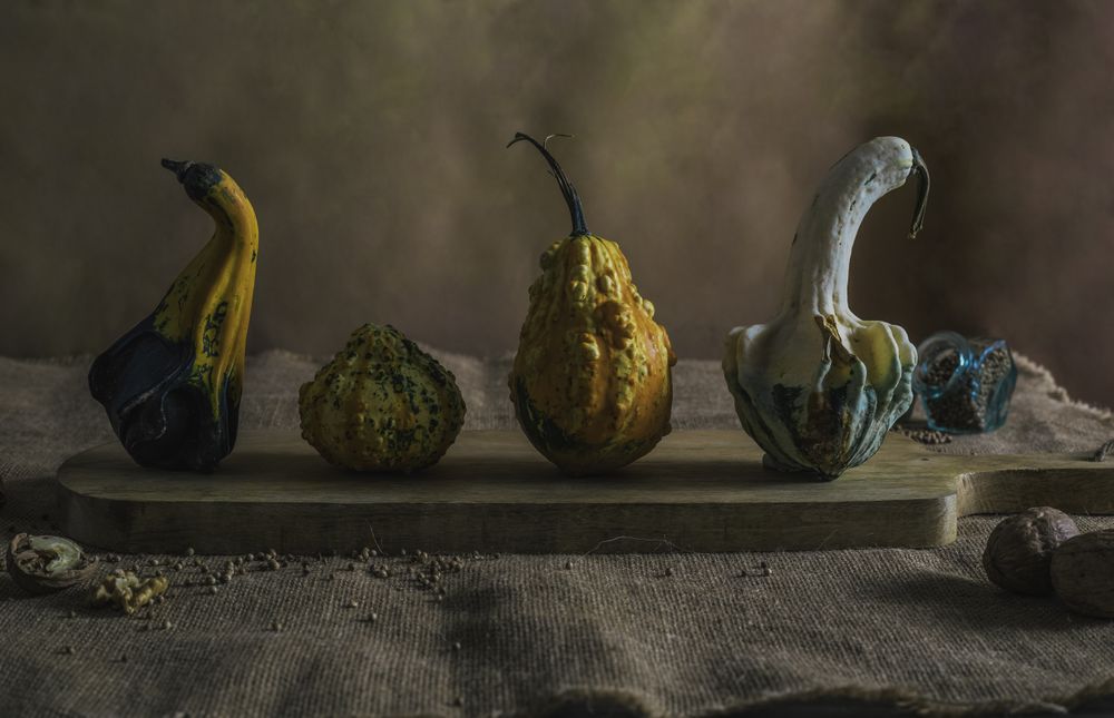 Small different pumpkins with condiments