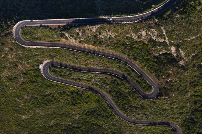 Curving road through desert landscape