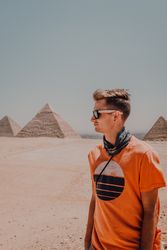 Young man against Great Pyramids