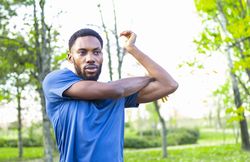 Morning Routine Wellness: Light Exercise and Mindfulness in Springtime Park Setting