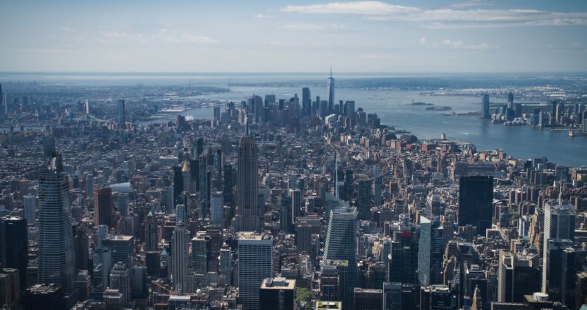 Scenic Aerial New York City View Towards Lower Manhattan Architecture. Panoramic Footage of Midtown Financial District from a Helicopter. Cityscape with Office Buildings and Skyscrapers