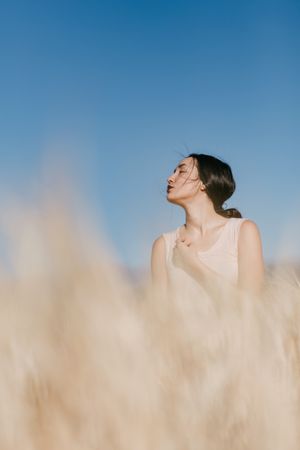 Female standing in field