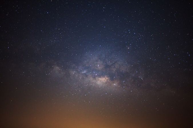 The milky way galaxy with stars and space dust in the universe, Long exposure photograph, with grain