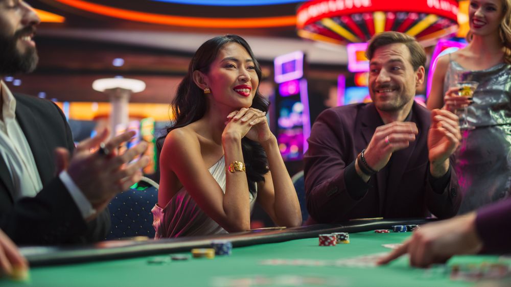 Evening in a Stylish Modern Casino: Diverse Group of People Playing in a Poker Game.