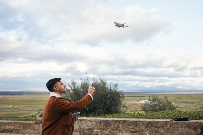 Photographer catching drone