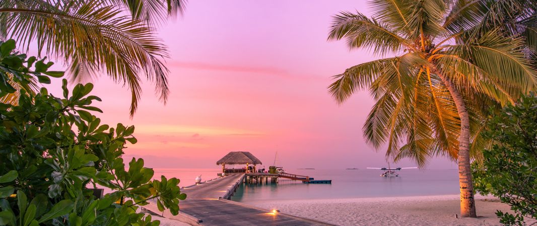 Beautiful pink sky over a pier