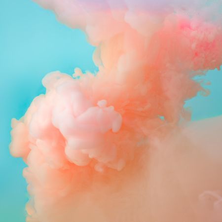 Cloud-like pastel pink color paint with teal background