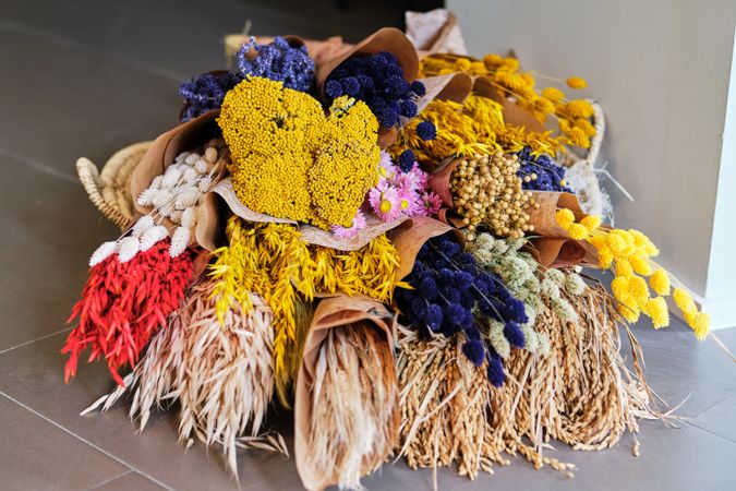 Bunch of blooming flowers on floor