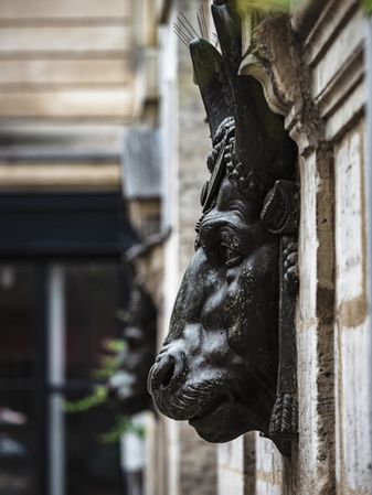 Ancient sculpture in one of the churches of Paris. Antique art.