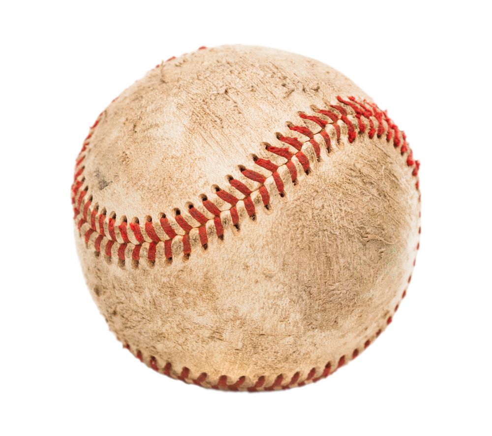 Single Slightly Worn Baseball Isolated on Blank Background.