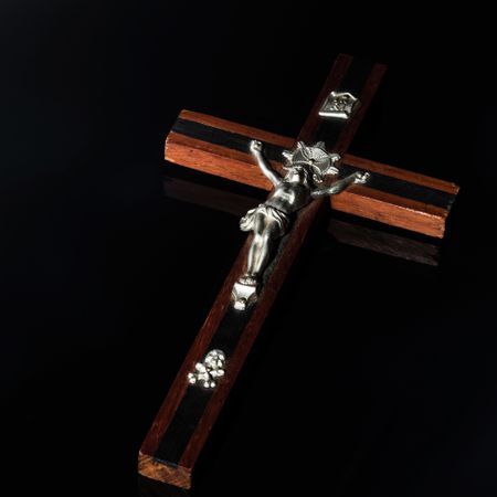 Catholic cross made of silver and mother-of-pearl. Antique jewelry.