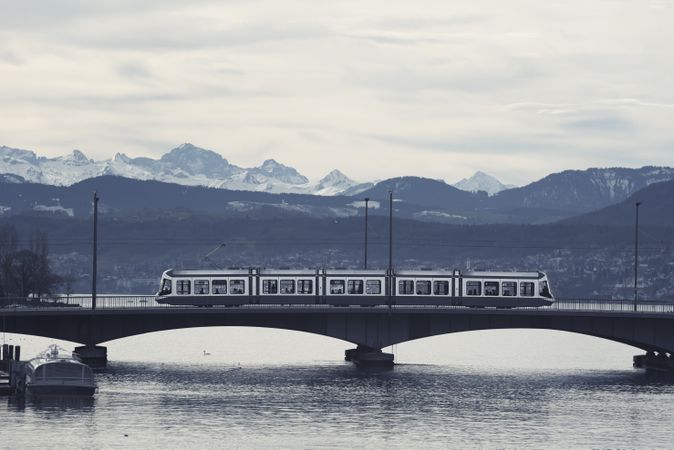 Tram in Zurich on bridge over lake