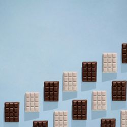 Chocolate bars in rows with copy space