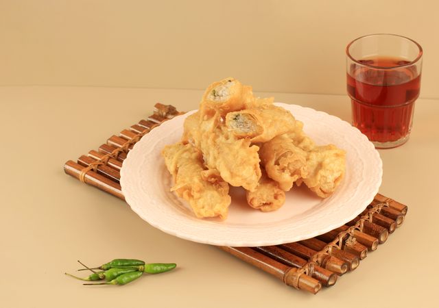 Plate of karoket, fried vermicelli noodles in roll