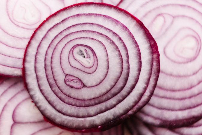 Slices of onion on tabletop