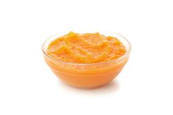 Bowl with healthy baby food isolated on plain background