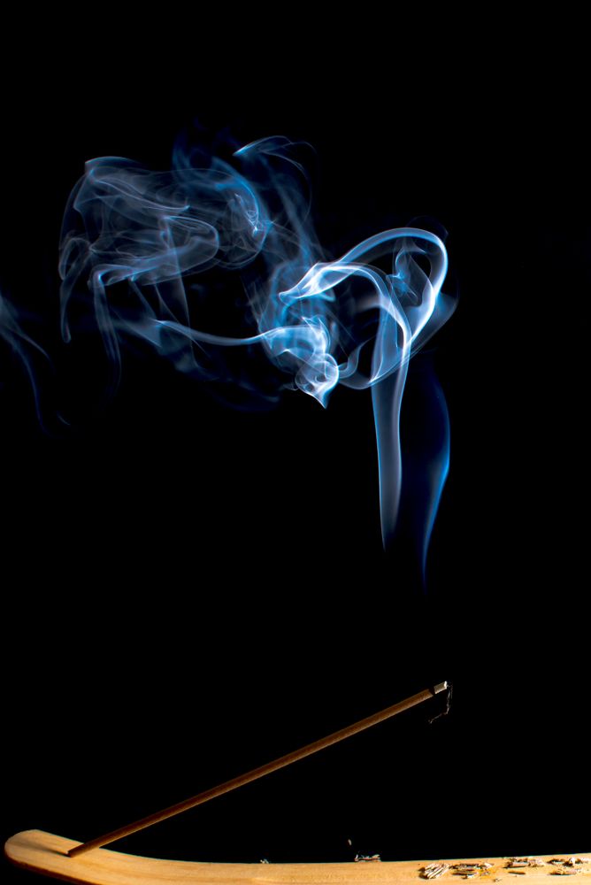 Swirls of bright blue fume