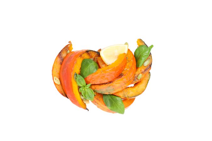 Baked pumpkin isolated on light background