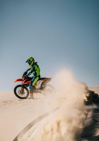 Full throttle riding in desert