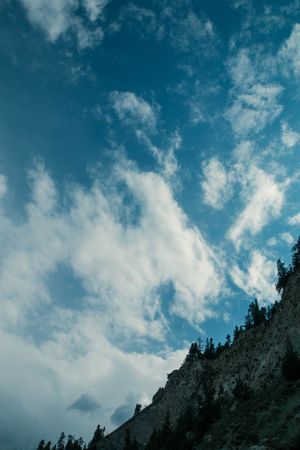 Side of mountain range in Pakistan under blue sky