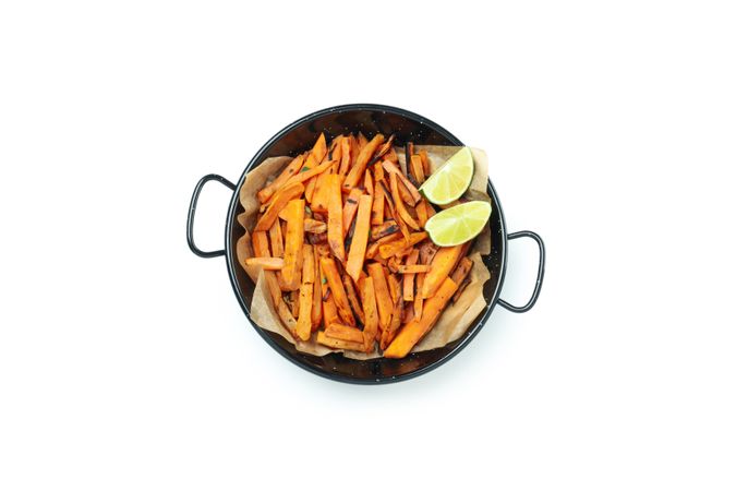Fried sweet potato, isolated on light background