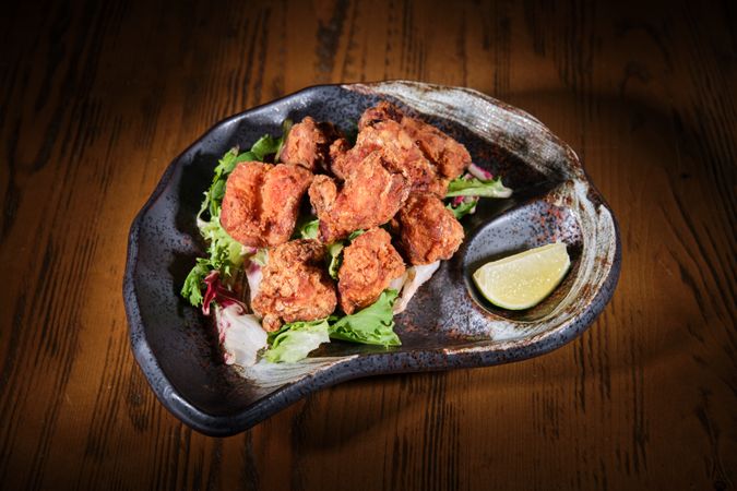 Fried chicken wings on plate