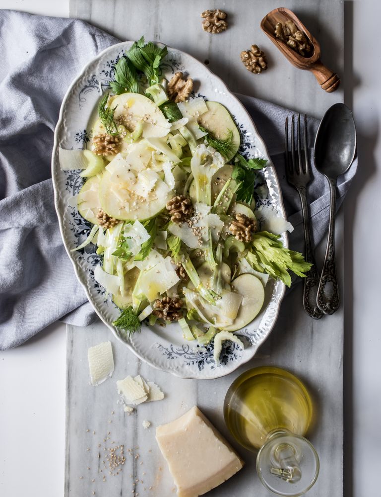 Gourmet salad with fruits, cheese and nuts