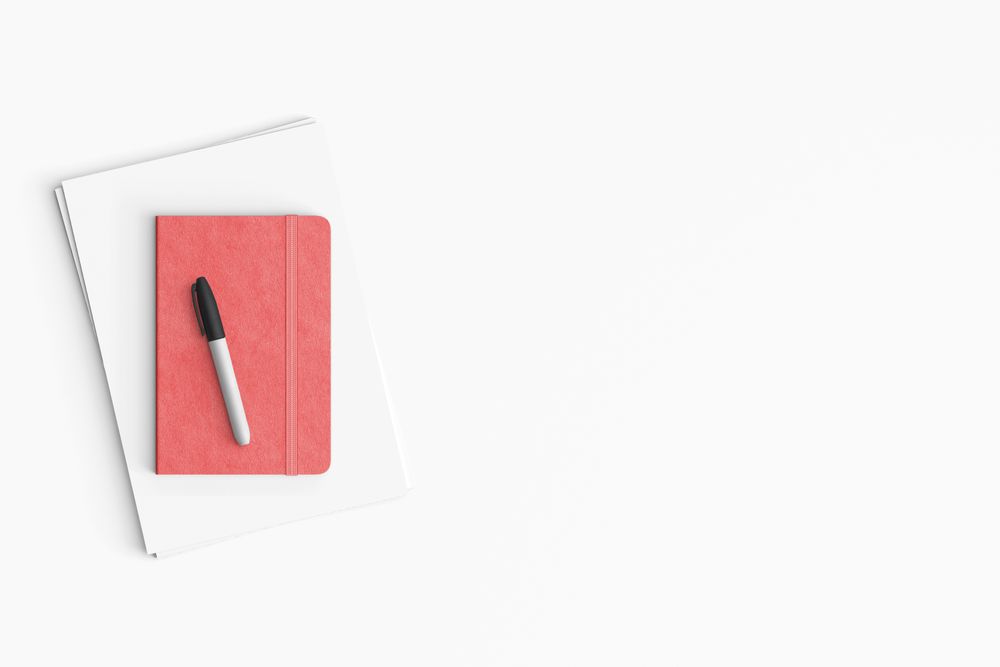 Modern workspace with, paper and notebook copy space