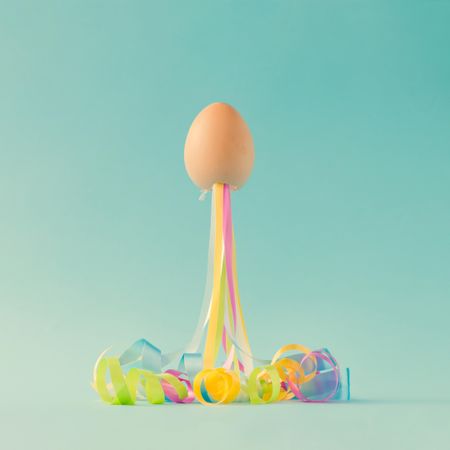 Egg with party streamers