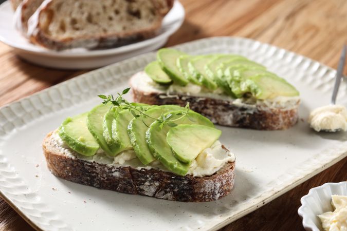 Open Sourdough Sandwich with Cream Cheese and Sliced Avocado