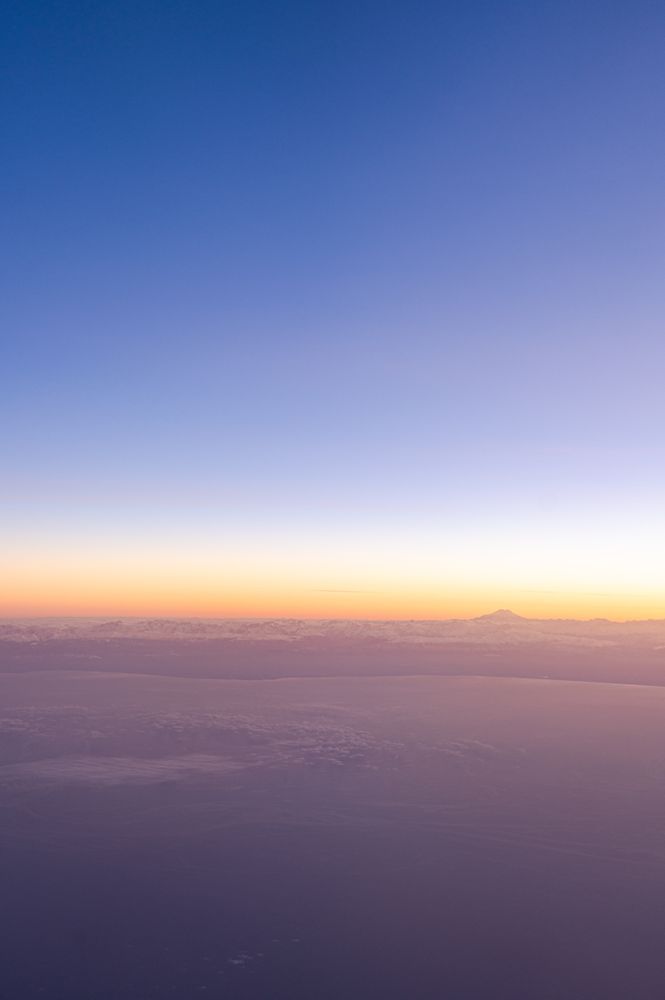 View of Caucasus mountain on the horizon line during sunrise