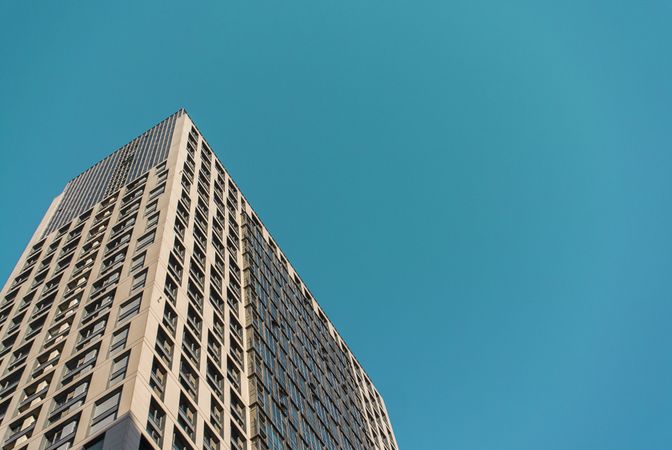 Gray concrete building under blue sky