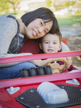 Chinese Mother Having Fun with Her Son