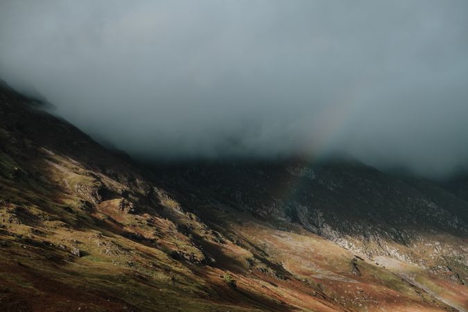 Rocky hills covered by mist in Scotland