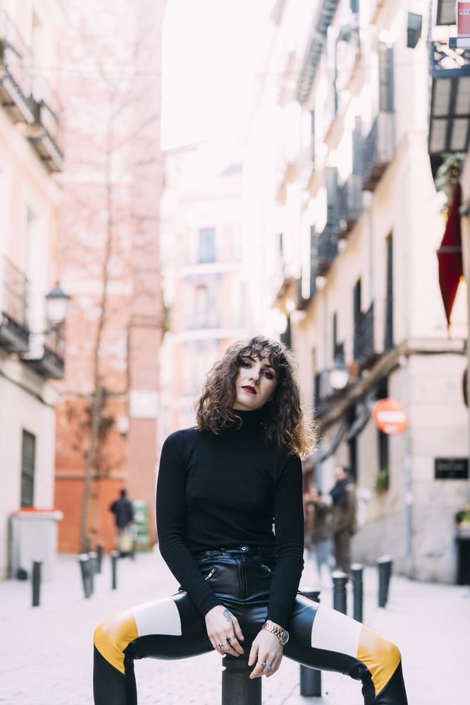 Young pretty woman posing in Madrid streets