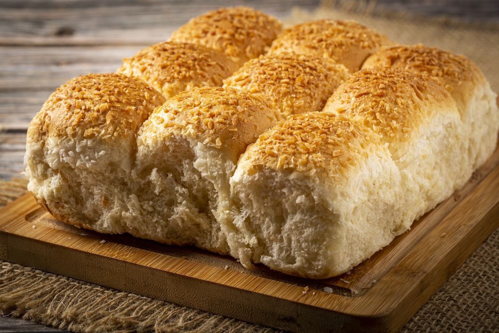 Coconut bread on the wooden table.